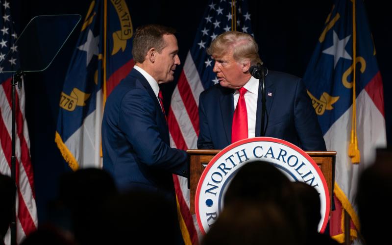 Congressman Ted Budd with Donald Trump at the 2021 NCGOP Convention where Trump endorsed Budd for U.S. Senate. (Photo from Carolina Journal.)