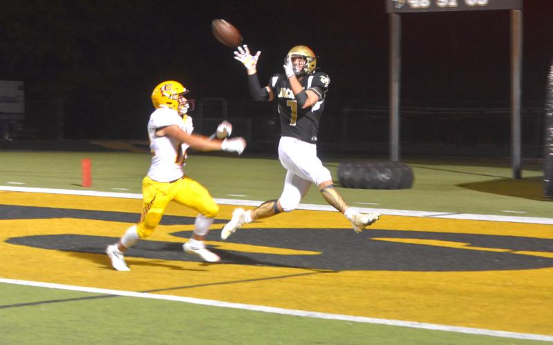 Travis Dockery • Clay County Progress Junior Kyle Lunsford beats a Cherokee defender and takes to the air for a touchdown catch against the Braves.