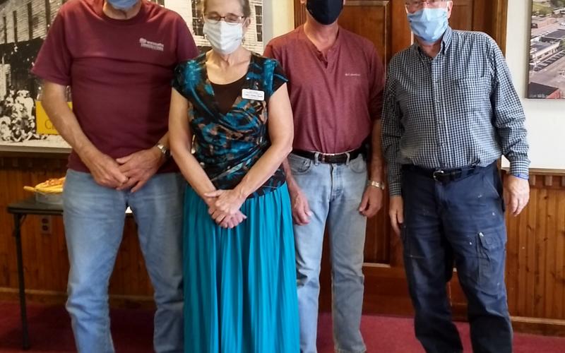 The monthly Small Town Main Street/Historic Hayesville Inc. meeting included a welcome by (L - R) Tommy Davis, Stu Jenner and Mayor Harry Baughn for a presentation by new Clay County Chamber Director Laura  Kleiss Hoeft (center) which included partner updates.