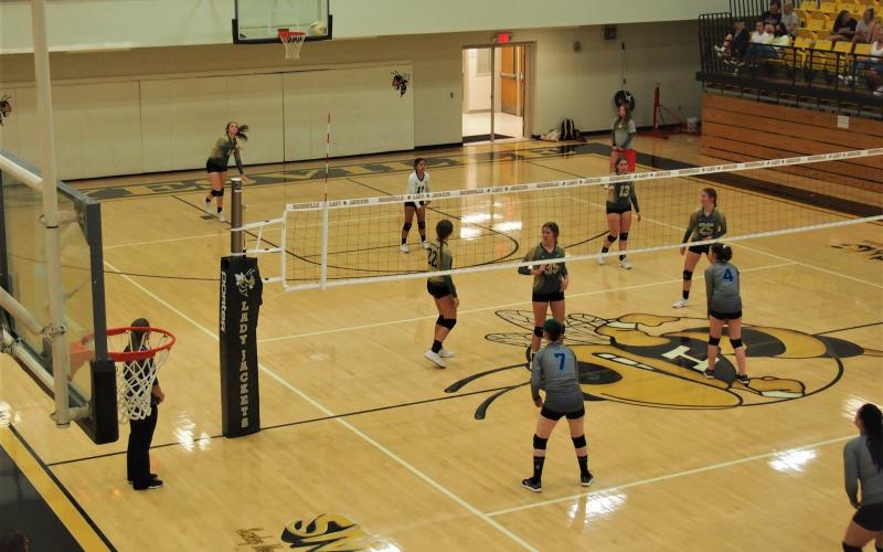 (Patrick Queen • Clay County Progress) Elyssa Brown smacks the ball for an ace serve in Hayesville’s quick 3-0 win over Nantahala.