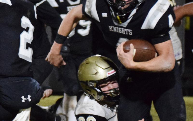 Art Miller • Graham Star Sophomore Taylor McClure locks on to a ball carrier for one of his team-high 17 tackles.