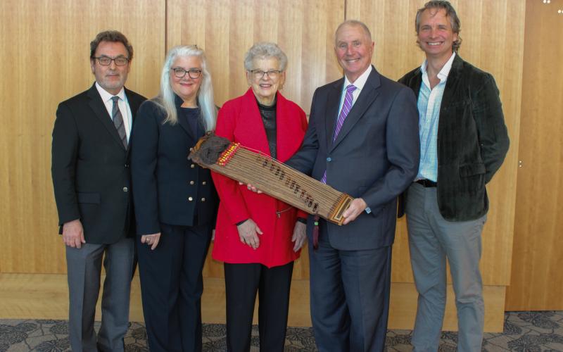 Dr. Keith DeFoor, Cynthia DeFoor, former First Lady Shirley Miller, 1954, Dr. Drew Van Horn, and Jeffrey Bauman with the Kayagum that Miller donated to the College.