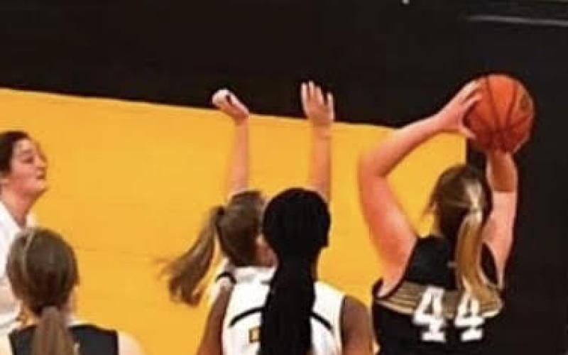 Ava Moore goes up strong in the paint for one of her six baskets from the floor
