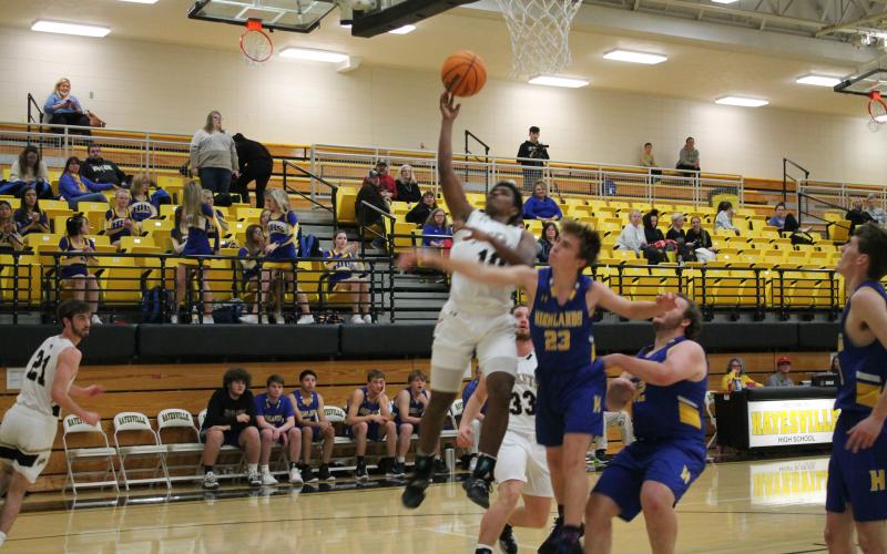 (Deby Jo Ferguson • Clay County Progress) Asher Brown goes up for 2 of his 14 points in first two quarters of game against Highlands.