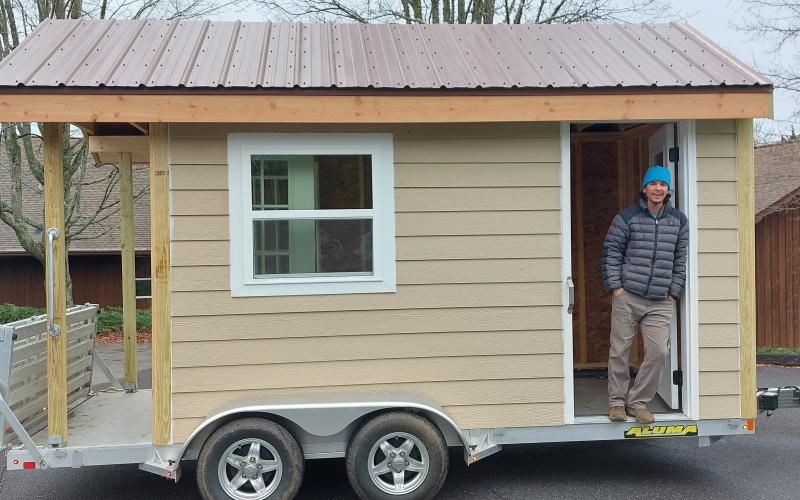 Hinton Home Repair Coordinator Nick Oliver will use the new house on wheels to teach basic tips on safe and healthy home repairs and maintenance. The mobile teaching unit was constructed by Oliver and Hinton Community Engagement Coordinator Ricky Hill.