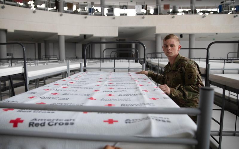 Paratroopers assist in preparing aid for distribution in Poland. Source: 82nd Airborne Division, U.S. Army