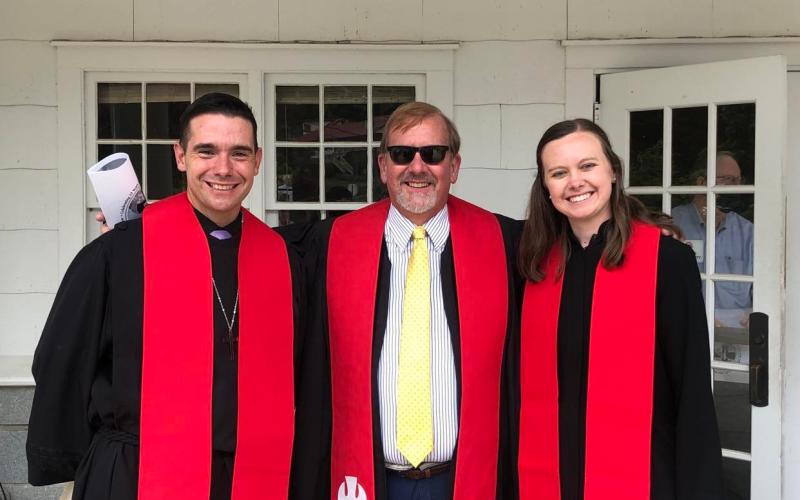 (Lorrie Ross • Clay County Progress) Pastor Bryan Wilson was ordained into the WNC Conference of the United Methodist Church in June 2021 at Lake Junaluska, N.C. After the ceremony, he posed with Hayesville First UMC Pastor Kirk Hatherly, center, who mentored Wilson and Pastor Nikki Baten, whom Wilson helped mentor as she attended seminary.
