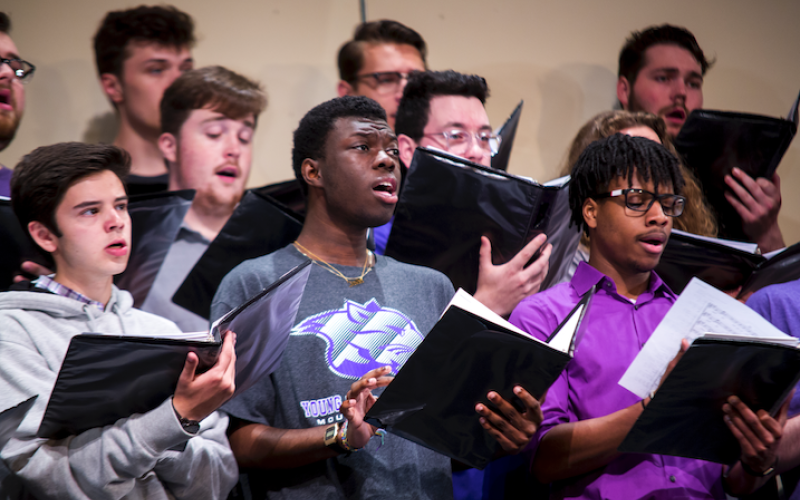 YHC choir students practice for spring events.