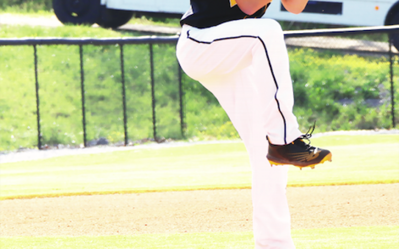 Braxton Cherry winds up for a take down pitch to a Cherokee batter.