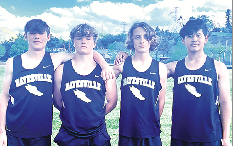 Setting new school record in the 4x400, from left, Colton Bruggers, EJ Abrams, Ben Bethel and Raul Rivera-Prieto.