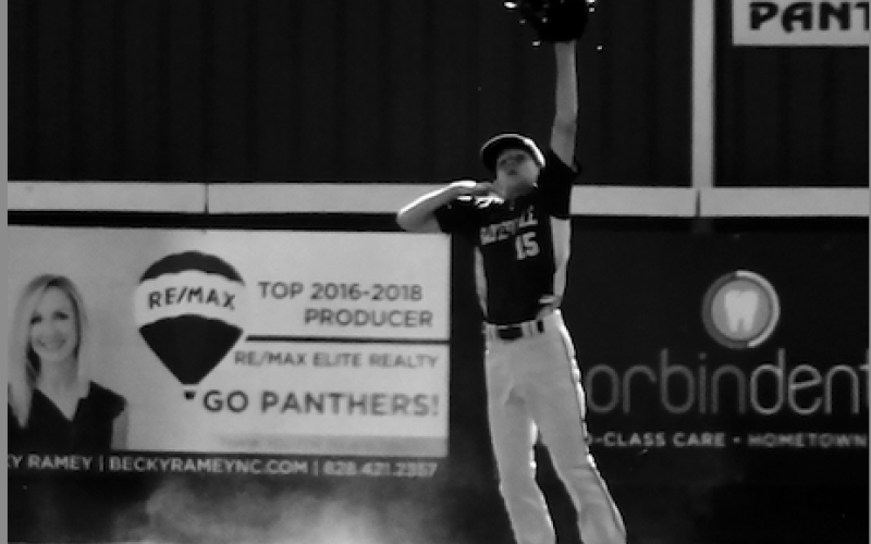 Rebecca Hall • Progress Micah Moss jumps high for the catch in the outfield.