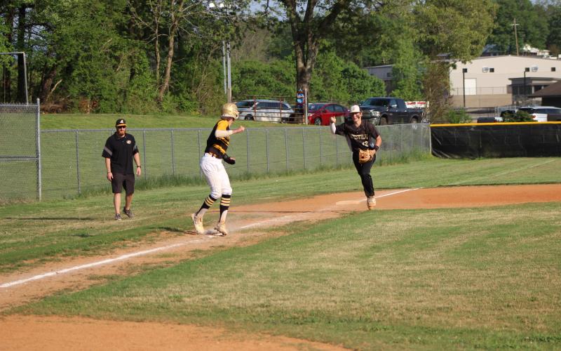 Rebecca Hall• Clay County Progress Caden Hall running down a Murphy player in a pickle.
