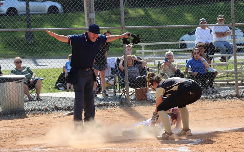 Deby Jo Ferguson • Clay County Progress Jasmine Brooks gives great attempt at tagging out runner at home plate.