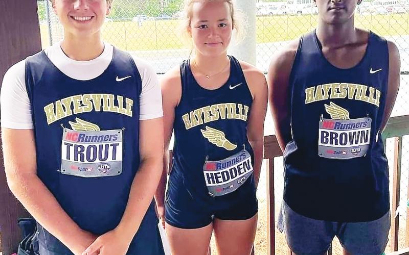 From left, Landon Trout, Blaire Hedden and Will Brown qualified for the state meet.