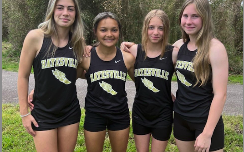 Skylar Lockaby, Kadence Morrow, Khylei Alberta and Briley Clampitt set new school record 4:57.07 in the 4x4oo relay.