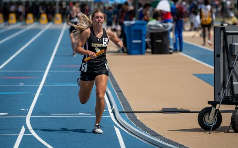 @hague.doug Emma Shook competing in the 3200 Relay in Greensboro at state meet.