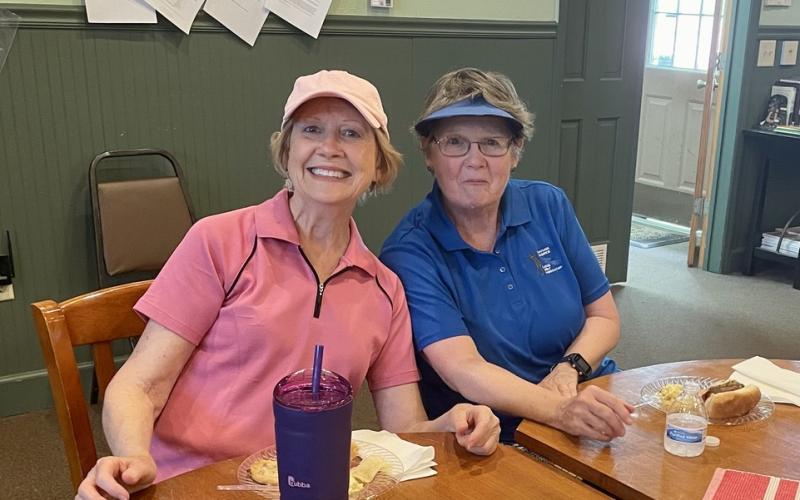 Two of the golf winners are Linda Robinson and Martha Barker.