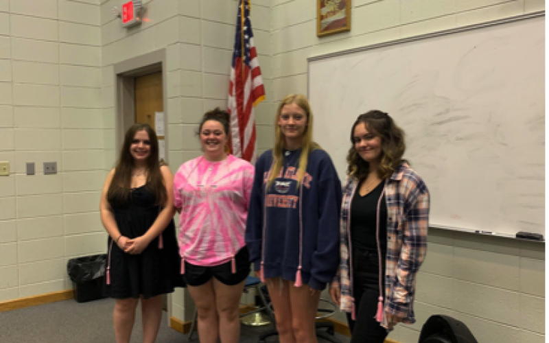 Seniors honored with a pink graduation cord are, from left, Bethany Lugo, Breanna “Burna” McGough, Serina Penland and Alex Perez.