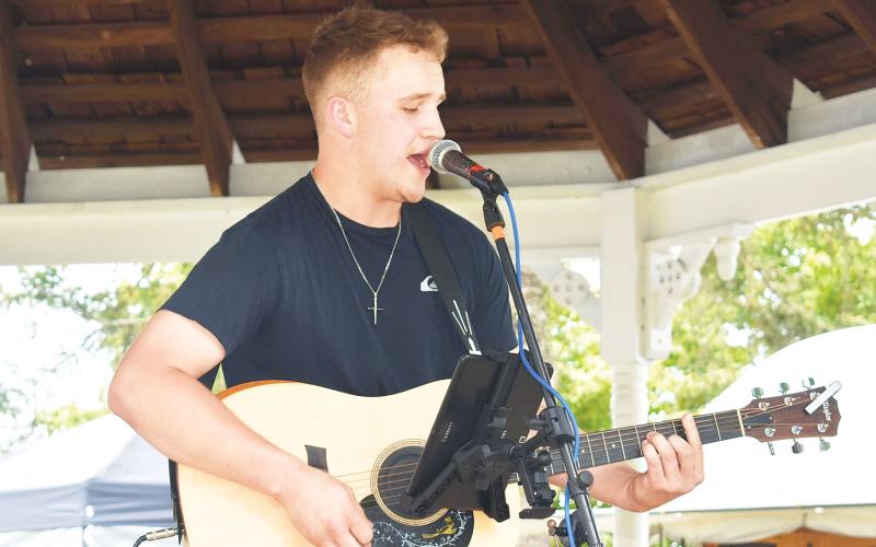 Hayesville hometown musician, 18-year-old Colton James performs traditional country from artists including Johnny Cash. Above he performs Dairus Rucker’s “Wagon Wheel.”