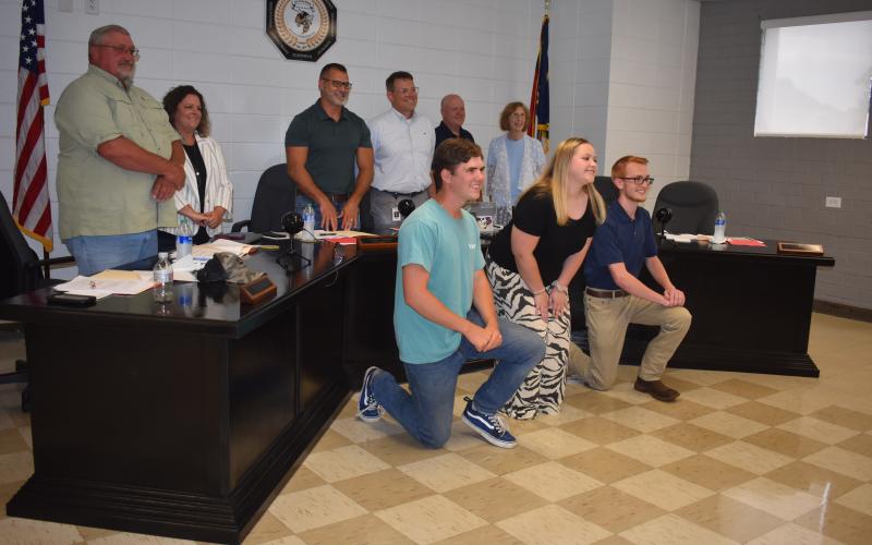 Marcia Barnes • Clay County Progress Clay County School Board members recognized seniors who attended the Empower Teen Leadership Summit.  Front, from left, are Dallyn Rhea, Lyndsey Evans and Jacob Christiansen; back, board members Danny Jones, Kelly Crawford, Jason Shook, Supt. Dale Cole, Robert Caldwell and Reba Beck.