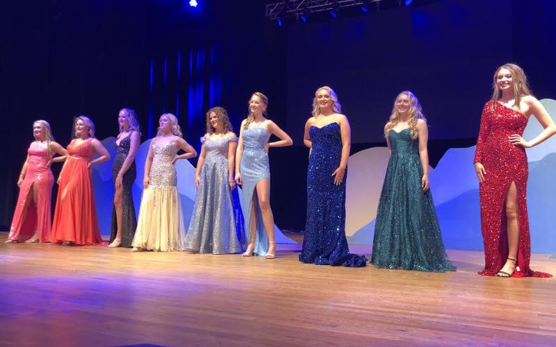 Deby Jo Ferguson • Clay County Progress Emily Byers crowns the winner of Miss Georgia Mountain Fair, Sara Shook, of Towns County. Shown on stage with them are, on left, is Emma Hyatt, second runner-up; and on right,  first runner-up, Kylee Parker.