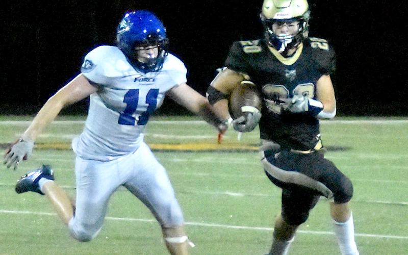 Gary Corsair • Clay County Progress Taylor McClure bolts to daylight on the way to a 102-yard evening.