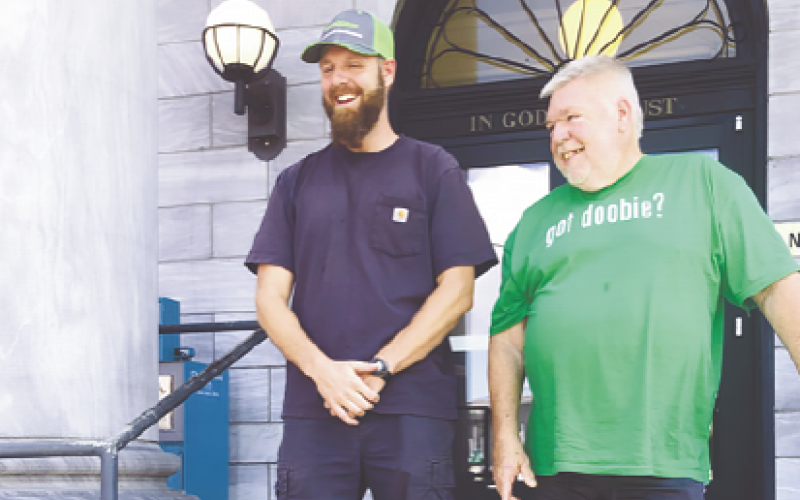 Abigail Hickman • Cherokee Scout Brody White and Bail agent Doobie White feel right at home outside the Cherokee County Courthouse in downtown Murphy.