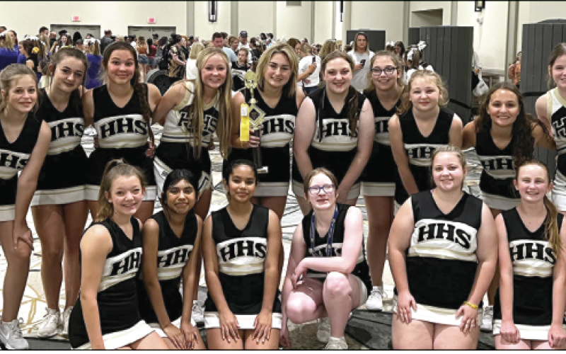 Yellow Jacket Cheerleaders are, from left: Katelynn Smith, Paula Huerta, Bella Duran, Olivia Ware, Lyndsey Evans and Lexi Coff ey; back, Coach Meghan McQuade, Angelina Simonds, Kyleigh Upegui, Jade Price, Chloe Price, Abby Joyce, Delaney Hilton, Abby Taylor, Delaney English, Aleena Chastain, Madison McGuff ee and Coach Yvette McQuade.