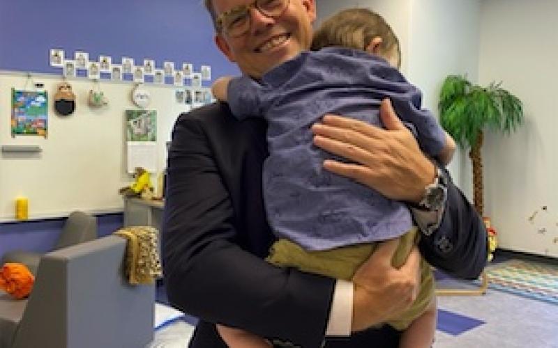 Photo submitted by Clay County Schools Clay County Schools Superintendent Dale Cole shares a comforting moment with a primary school student on the first day of school earlier this week. "We both needed it and made each other feel much better," Cole said.