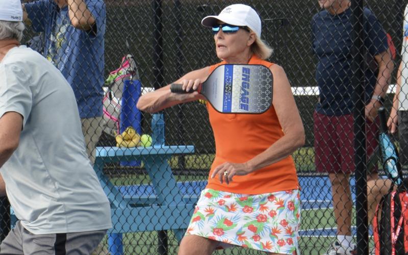 Desna Jarrett competes in a recent doubles game at the new outdoor courts.