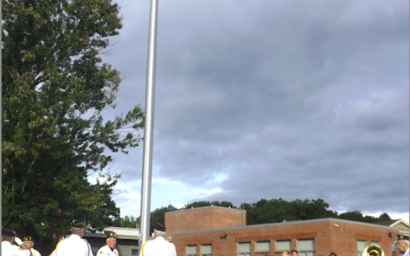 Deby Jo Ferguson • Clay County Progress The American Legion salutes while the school band performs during the raising of the flag, at the site designated to the memory of band director Jennifer Gibson.