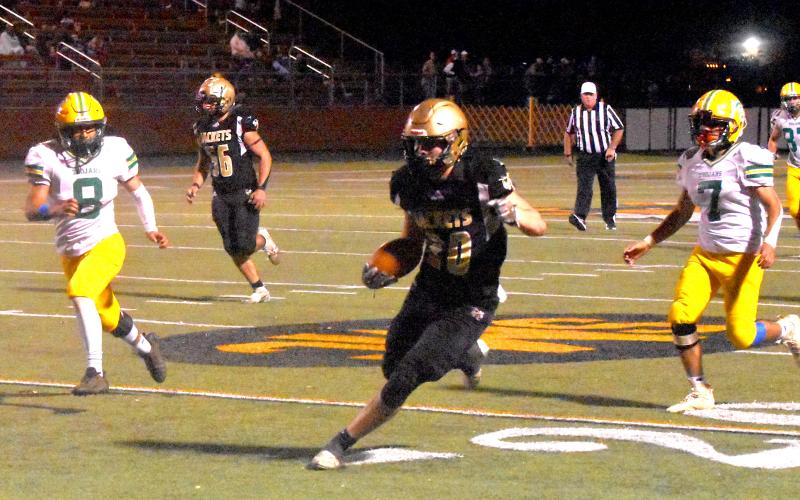 Gary Corsair • Clay County Progress   Hayesville tight end Avery Leatherwood, No. 10, heads up field after catching a Logan Caldwell pass.