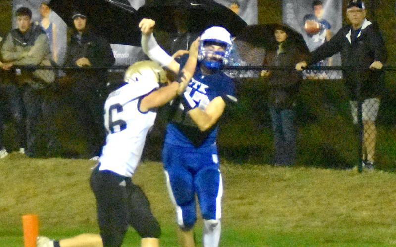 Gary Corsair • Clay County Progress Yellow Jackets two-way standout Cameron Payne lowers the boom on quarterback Reid Maxwell. The pass fell incomplete.