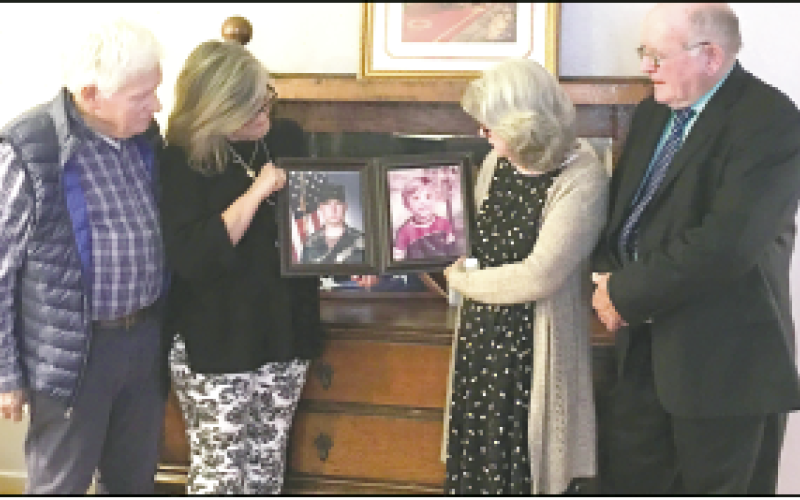 Leon and Irene Penland and Lois and Bill Dyer share pictures of their sons, Leon Reece Penland Jr., and Jason Dyer, both of whom died at a young age. Penland while serving his country and Dyer when he was 10 years old.