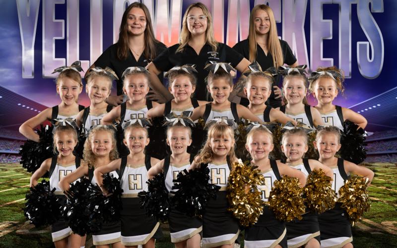 Hayesville Yellow Jacket Peewee Cheerleaders are, from, front left, Audrey Moore, Ava Whitlow, Averie Morgan, Caroline Taylor, Emorie Long, Emmalié Danico, Cheyenne Struchko and Charla Segars; second row, Jayden Jeff ries, Lakelynn Ledford, Payton Taylor, Raelyn Chaffi n, Ryleigh Ramey, Perrie Ledford, Olivia Petty and Kynleigh Cook; back, Coaches Leeanna Alberta, Emily Ledford and Kyleigh Alberta.