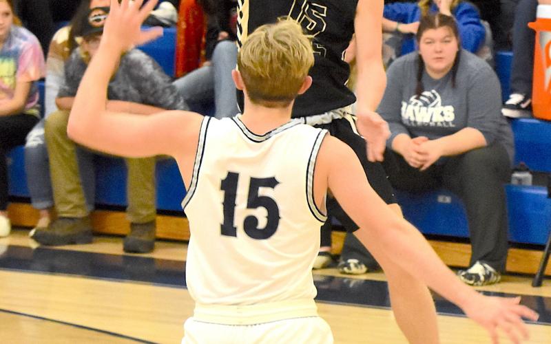 Gary Corsair • Clay County Progress Hayesville's Landon Hughes breaks Nantahala's full-court press with a jump pass to a teammate Tuesday night.