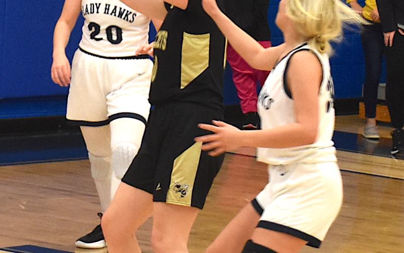 Gary Corsair • Clay County Progress Hayesville center Brooke Graves spins into the lane for a basket in the second quarter of Hayesville's 65-28 triumph over Nantahala on Tuesday.