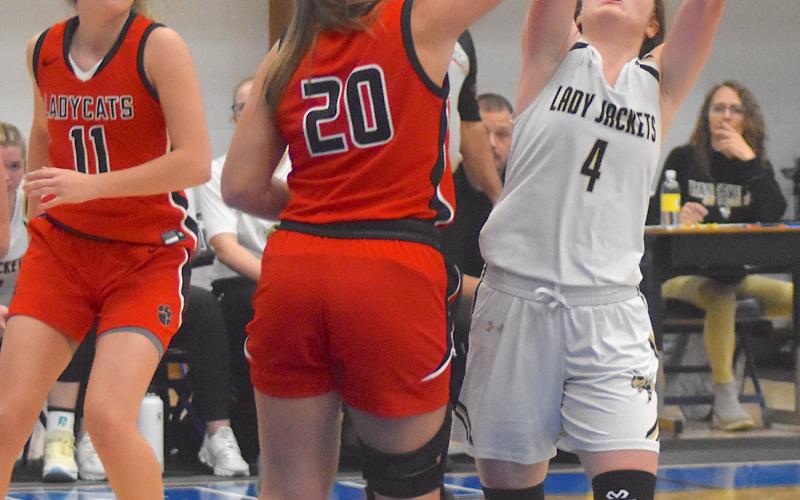 Breanna Abrams, No. 4, goes vertical to get the ball against Rabun County