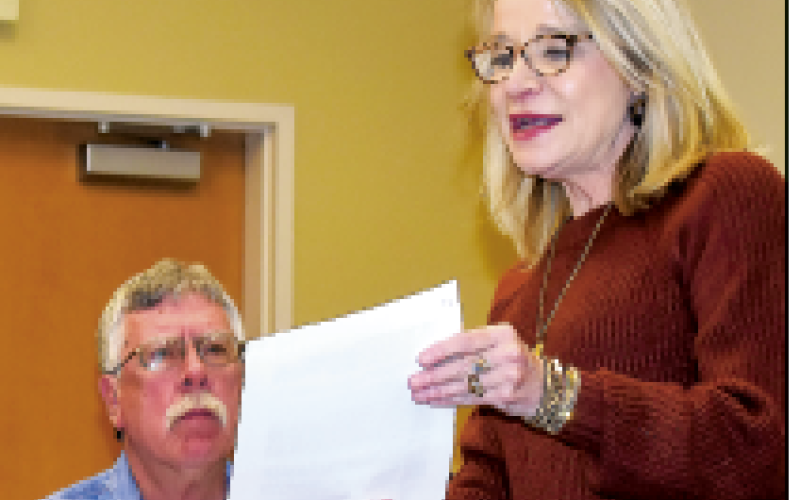 Becky Long • Clay County Progress County Manager Debbie Mauney explains a new rate structure for Clay County Emergency Services to Dwight Penland and other commissioners. The 9 percent increase in the fee schedule was approved Jan. 5