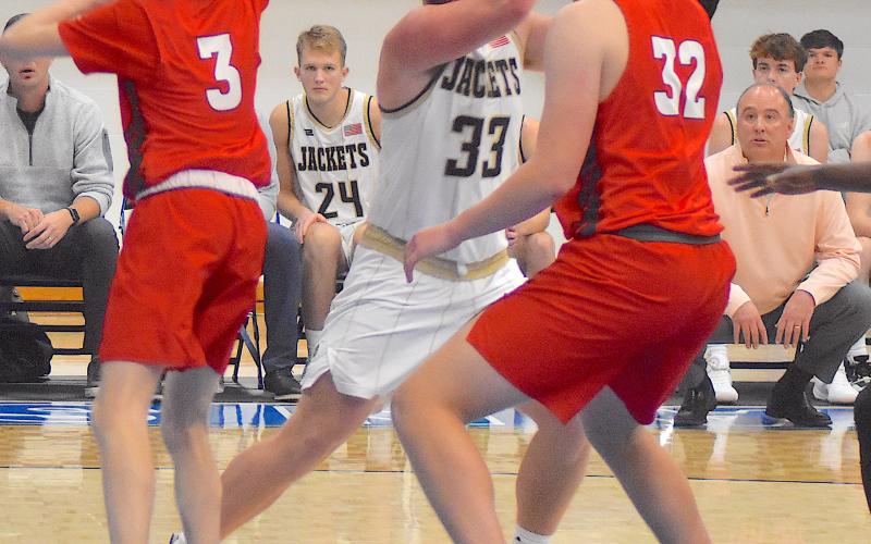 Gary Corsair • Clay County Progress Hayesville center Kyle Lunsford, No. 33, powers through a Polk County double team.