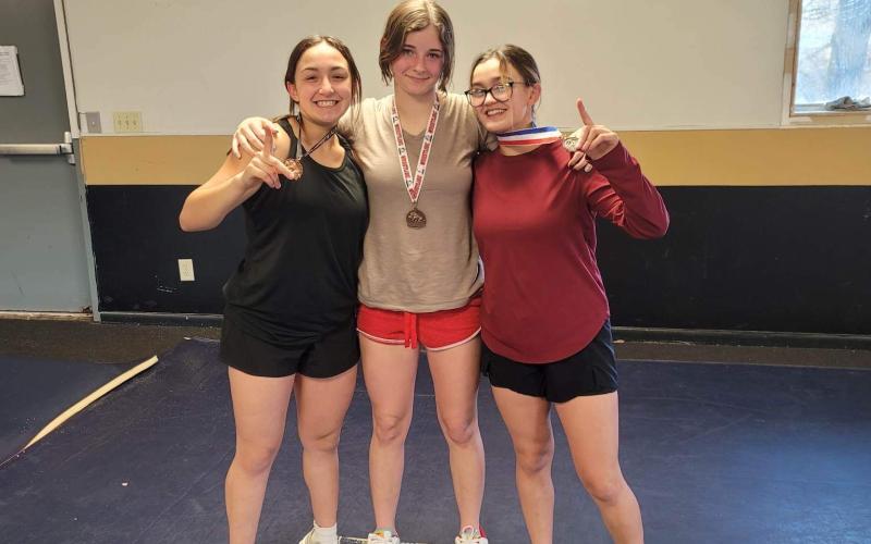 Lilli, Riley and Amyna Denton are training for competition in North Henderson.