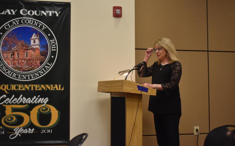 Becky Long • Clay County Progress Clay County Manager Debbie Mauney reads three resolutions during the Thursday, Feb. 2 commission meeting. The resolutions passed unanimously and will bring about several new projects in the county including an arena for community events.