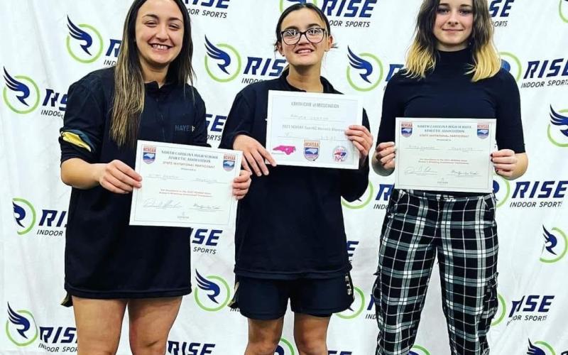 From left, Lilli Denton, Amyna Denton and Riley Denton makes history for Hayesville High School at the state level.