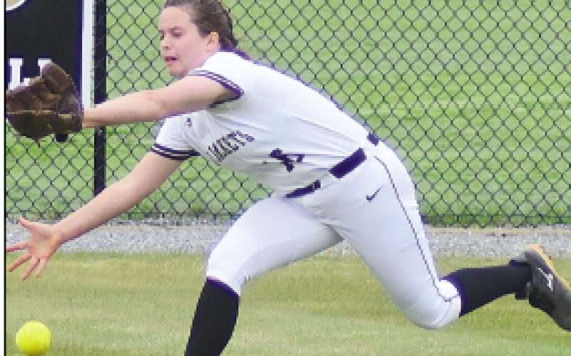 Gary Corsair • Clay County Progress Hayesville left-fielder Morgan Crawford dives for a sinking line drive in an attempt to keep Andrews from tying the score in the top of the seventh inning.