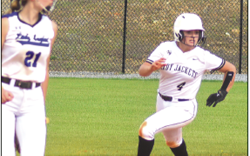 Gary Corsair • Clay County Progress Hayesville's leading hitter Faith Odell rounds second base during a fourth-inning uprising against Hiwassee Dam.