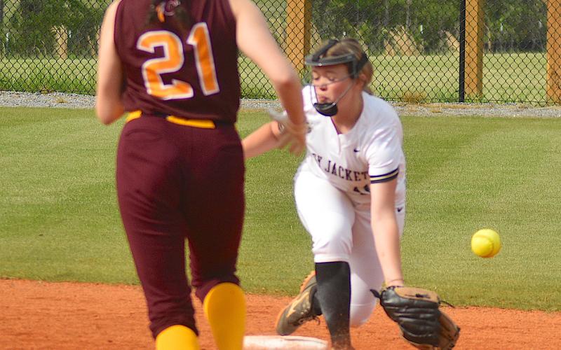 Gary Corsair • Clay County Progress Yellow Jackets second baseman Raylyn Taylor reaches for the ball on a stolen base by Cherokee.