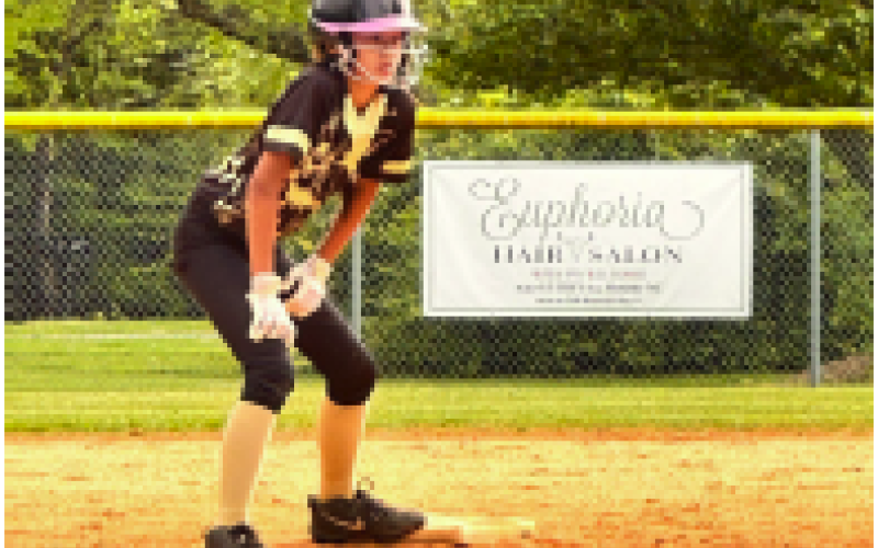 Lucy Trout on second base waiting for the opportunity to steal.