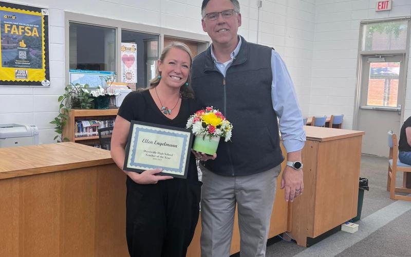 Ellen Engelmann, Hayesville High School art teacher, was chosen as HHS Teacher of the Year by her coworkers, HHS principal Stacey Overlin presented a certificate and flowers to her on behalf of the school.