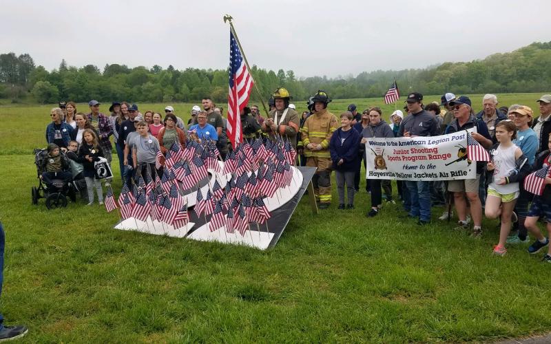 Participants gather at the 22 flags symbolizing the number of veterans on average committing suicide each day. Saturday’s walk to raise suicide awareness generated solid participation from various members of the community including the sponsors’ American Legion Post 532, Clay Fire Department and Sheriff’s Office along with representation from Towns County law enforcement.