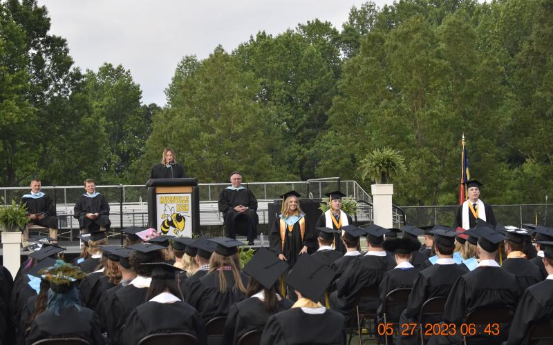 HHS School Counselor Erin McCoy recognizes the Honor Societies.